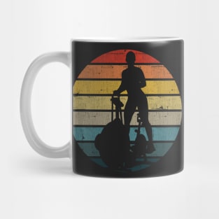 Exercise Bike Silhouette On A Distressed Retro Sunset product Mug